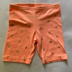 Old navy girl’s 🍍 orange bike shorts.